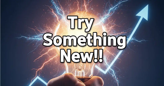 Glowing electrified bulb with yellow-orange light and blue bolts to spark new routines