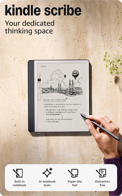 Black kindle scribe tablet with paper-like screen displaying handwritten notes and premium pen to start writing easily