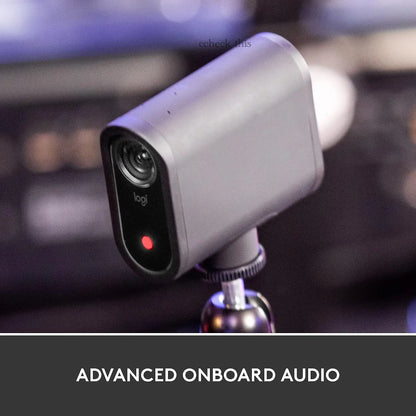 Silver logitech mevo start live streaming camera with black lens housing and red indicator light for video capture