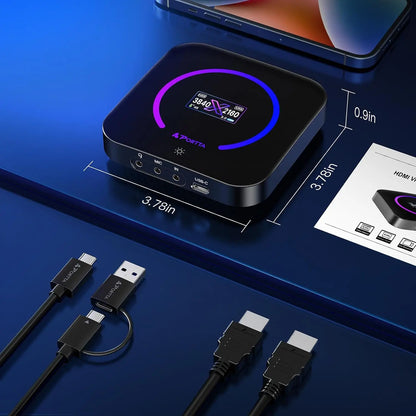 Black rectangular dx20r hdmi video capture device with glowing purple blue display showing 1080p 240hz resolution