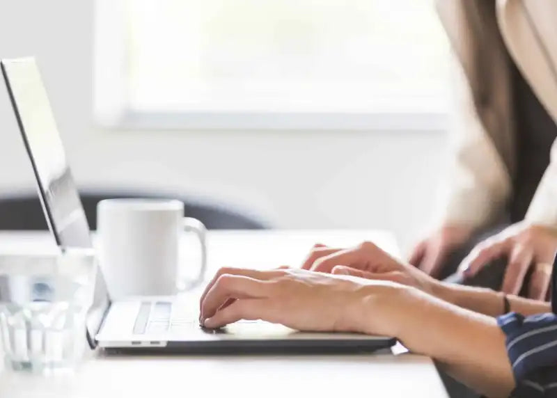 Woman at computer learning a new skill
