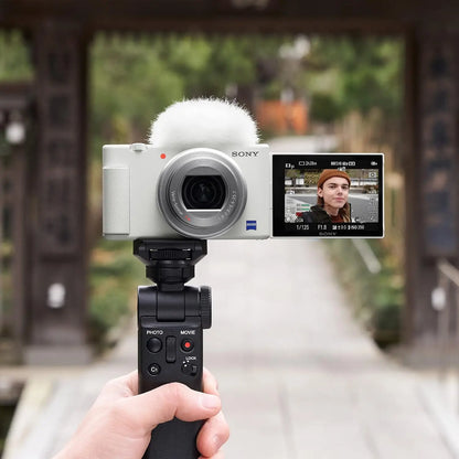 White sony zv-1 camera with fluffy white microphone and image stabilization for content creators and vloggers
