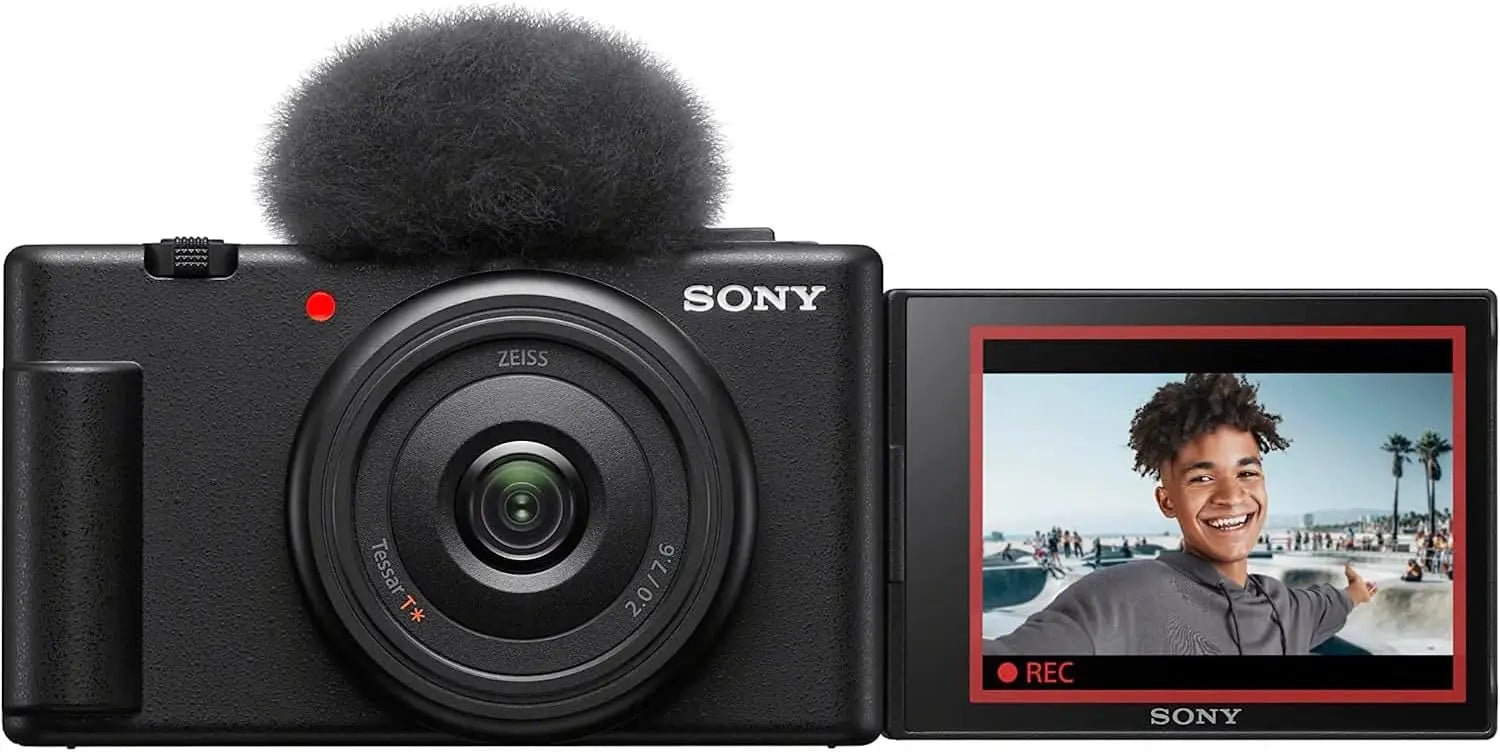 Black sony zv-1f vlog camera with flip-out screen and fuzzy mic showing recording designed for content creators