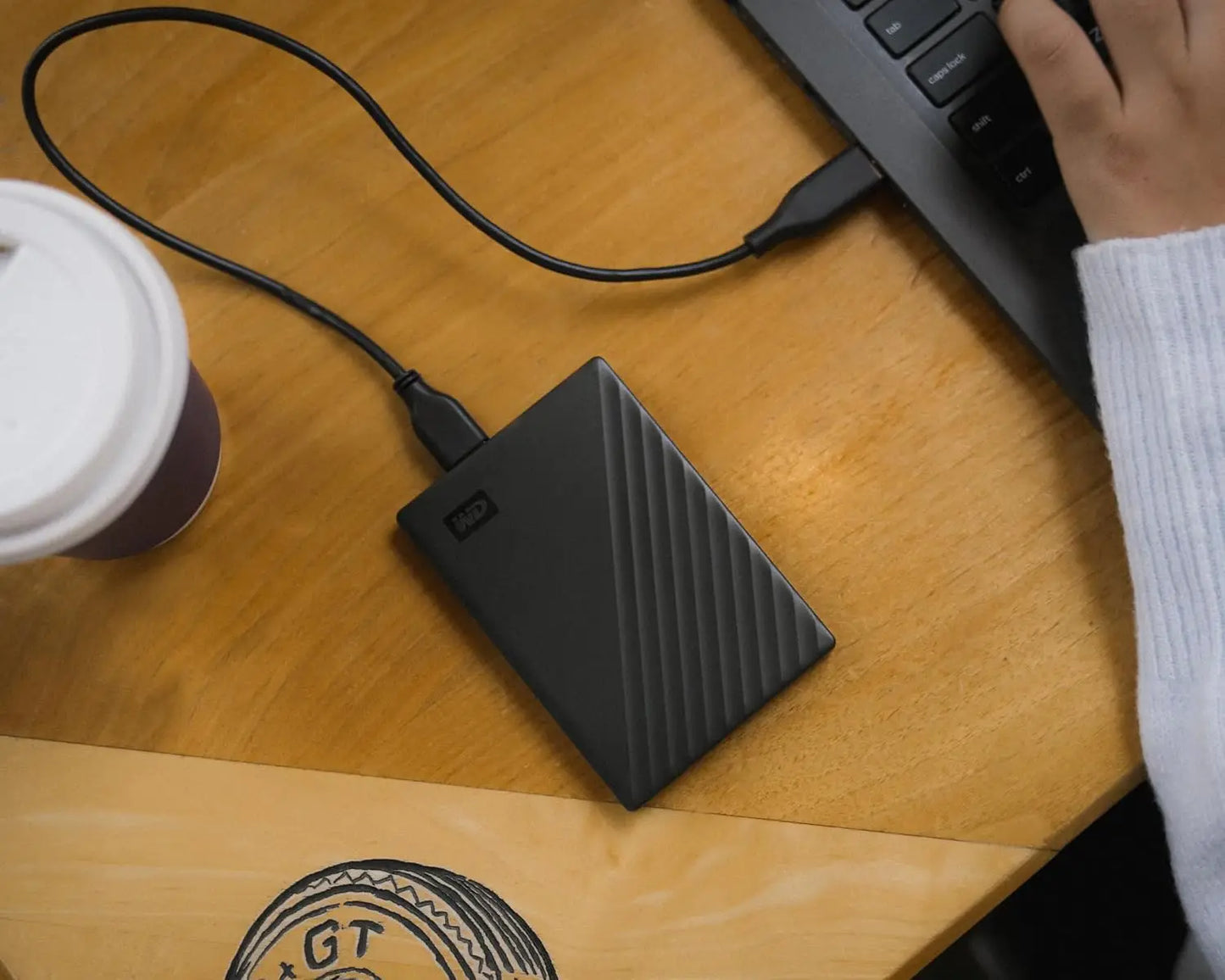 Black wd 5tb my passport portable hard drive with textured diagonal stripes and usb 3.1 backup software protection