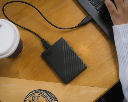 Black wd 5tb my passport portable hard drive with textured diagonal stripes and usb 3.1 backup software protection